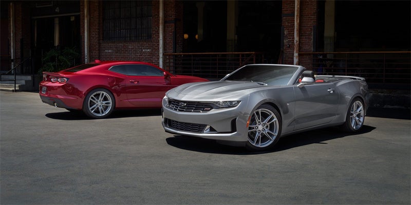 Rendering of a 2024 Chevrolet Camaro convertible showcasing its sleek design and sporty features.