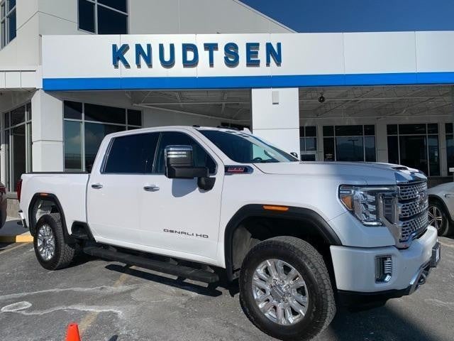 White GMC Denali HD siting outside Knudtsen Chevrolet