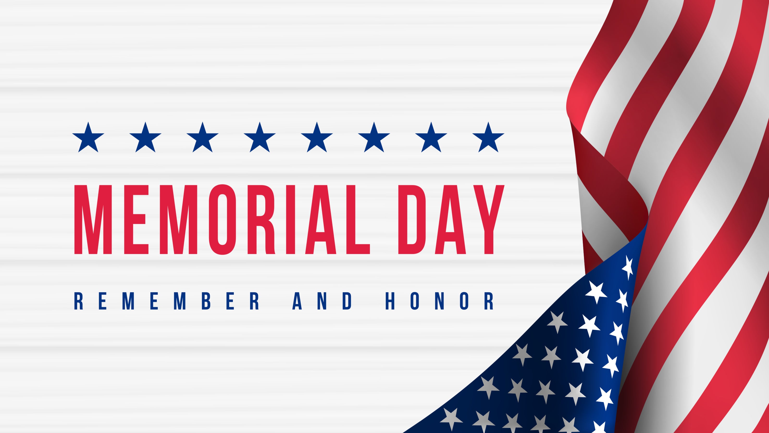 Memorial Day background featuring the American flag with stars, symbolizing patriotism and remembrance.